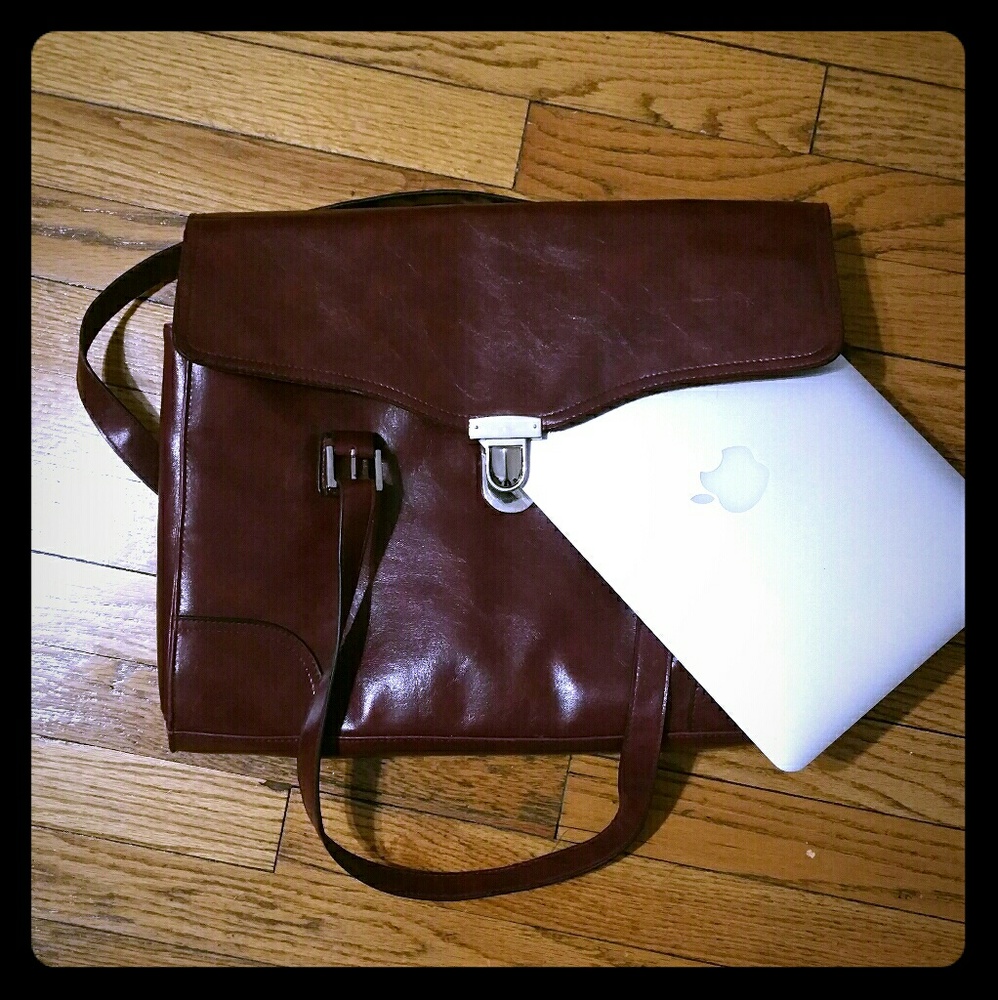 Maroon leather briefcase with multiple pockets